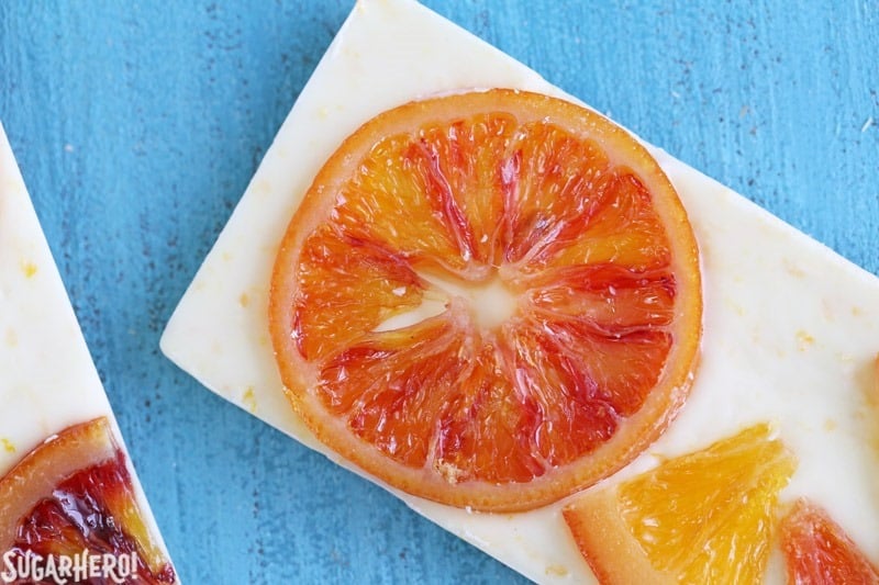 Candied Orange White Chocolate Bars - white chocolate bars with orange zest and candied oranges. Sweet, tart, and tangy! | From SugarHero.com