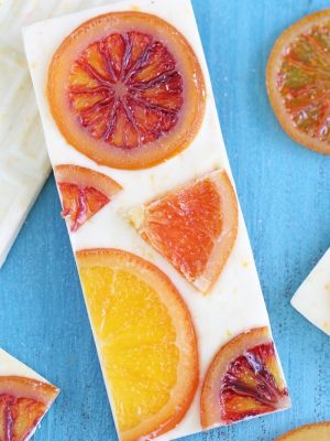 Bottom of a Candied Orange White Chocolate Bar showing the oranges.