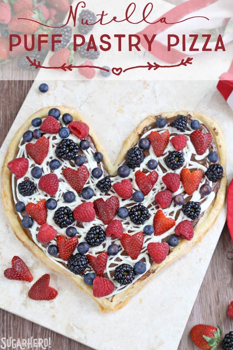 Nutella Puff Pastry Pizza is easy and delicious. You’ll love the combination of buttery puff pastry, Nutella, white chocolate, and juicy fresh berries! | From SugarHero.com