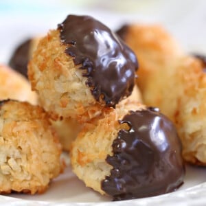Close up of Coconut Macaroons dipped in chocolate.
