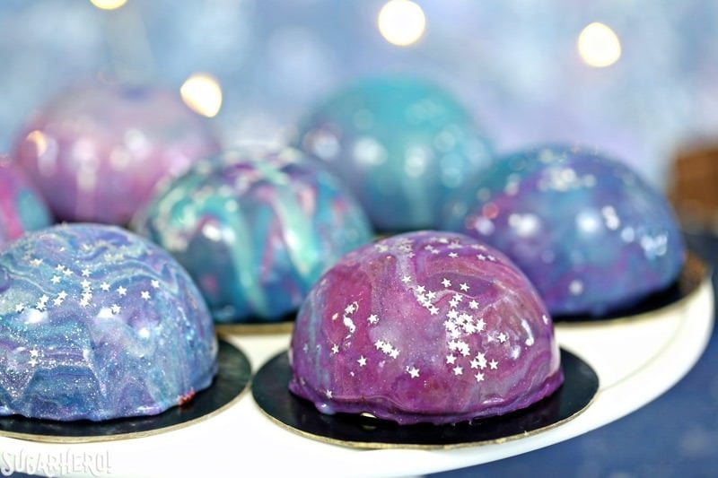 Galaxy Mousse Cakes - A close up shot of the mini cakes. | From SugarHero.com