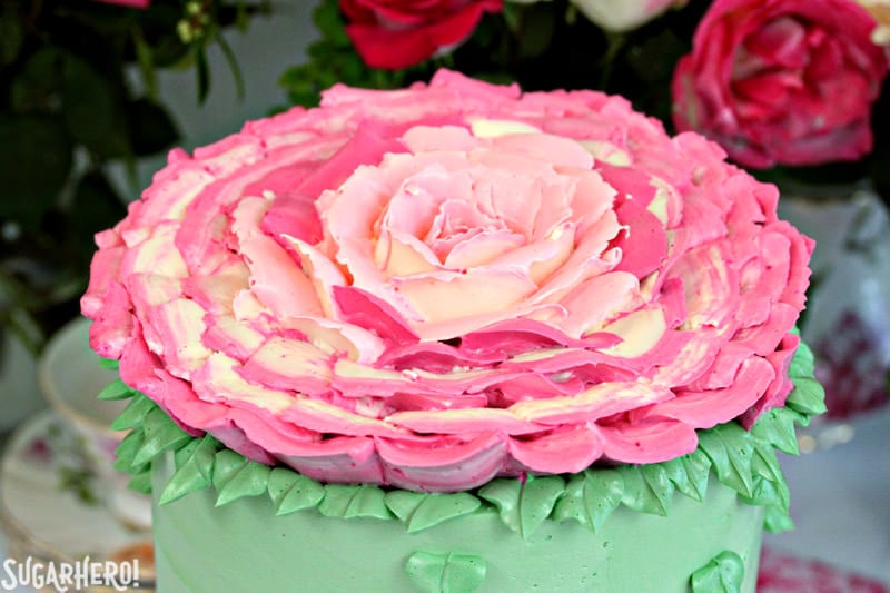 Giant Rose Cake - a gorgeous four-layer cake topped with a huge buttercream rose! | From SugarHero.com