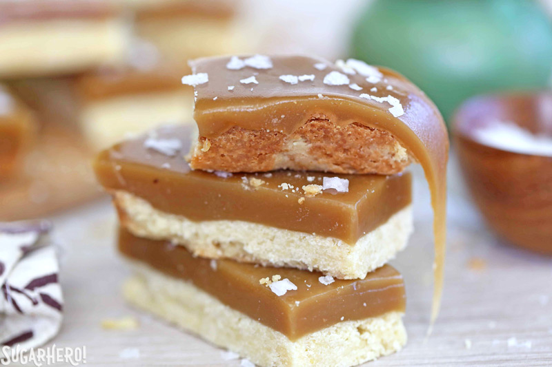 Salted Caramel Bars - buttery shortbread, soft and chewy caramel, and crunchy sea salt! | From SugarHero.com