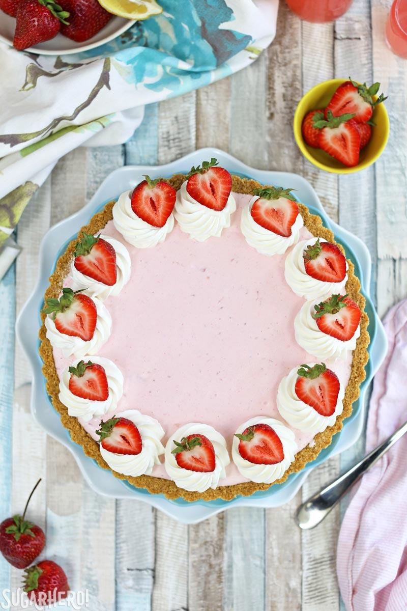 Strawberry Lemonade Ice Cream Pie - an easy and refreshing ice cream pie in a graham cracker crust! | From SugarHero.com