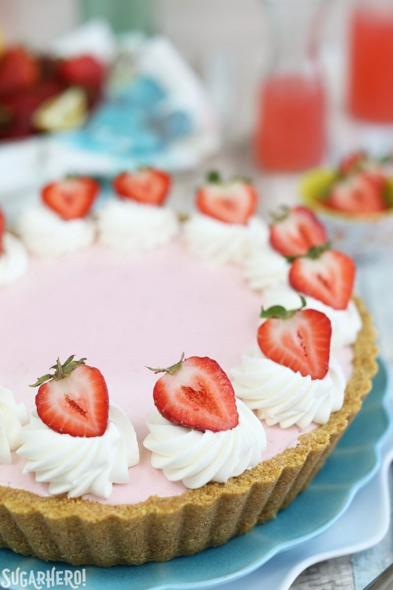 Strawberry Lemonade Ice Cream Pie - an easy and refreshing ice cream pie in a graham cracker crust! | From SugarHero.com