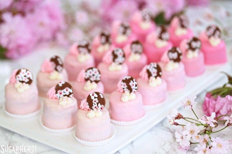 Cherry Blossom Petit Fours - cute little cake bites filled with cherry buttercream and jam! | From SugarHero.com