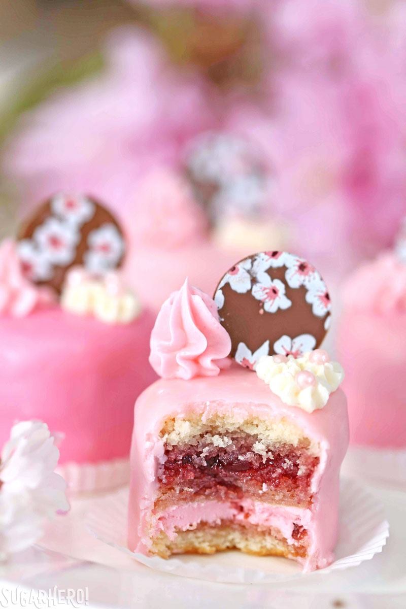 Cherry Blossom Petit Fours - cute little cake bites filled with cherry buttercream and jam! | From SugarHero.com
