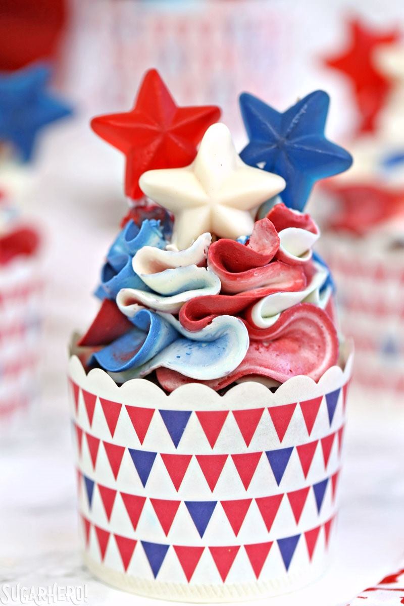 Red, White and Blue Cupcakes - pretty ruffled red velvet cupcakes, perfect for the Fourth of July! | From SugarHero.com