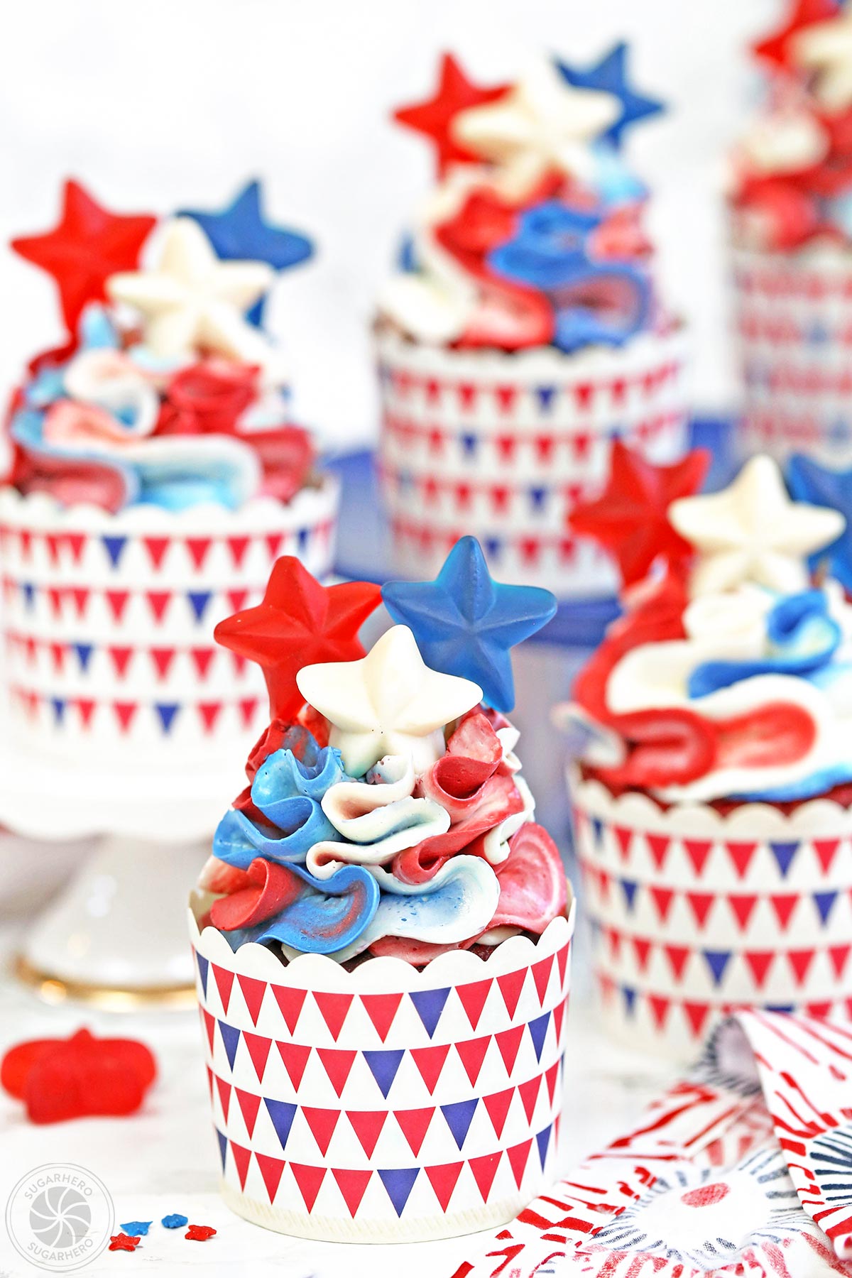 Red, White and Blue Cupcakes - pretty ruffled red velvet cupcakes, perfect for the Fourth of July! | From SugarHero.com Red, White and Blue Cupcakes - pretty ruffled red velvet cupcakes, perfect for the Fourth of July! | From SugarHero.com