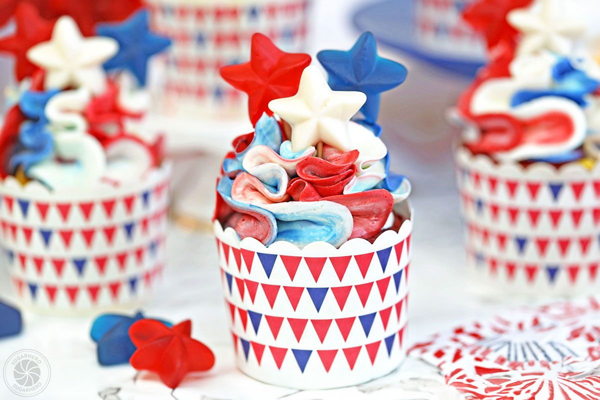 Red, White and Blue Cupcakes - pretty ruffled red velvet cupcakes, perfect for the Fourth of July! | From SugarHero.com