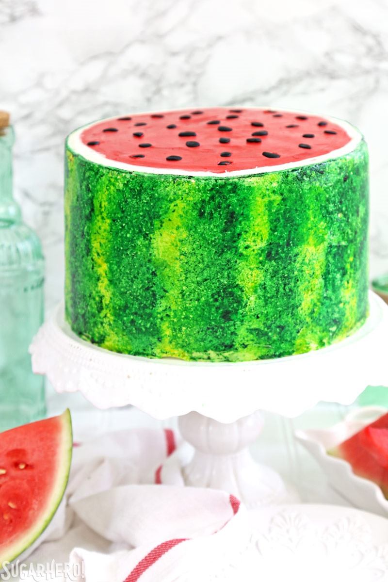 Watermelon Layer Cake - a fun cake that looks AND tastes like a watermelon! | From SugarHero.com Watermelon Layer Cake - a fun cake that looks AND tastes like a watermelon! | From SugarHero.com