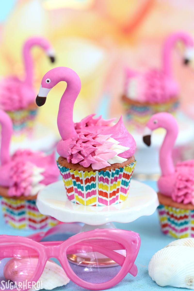Picture of Flamingo Cupcakes with pink sunglasses, seashells, and a yellow background