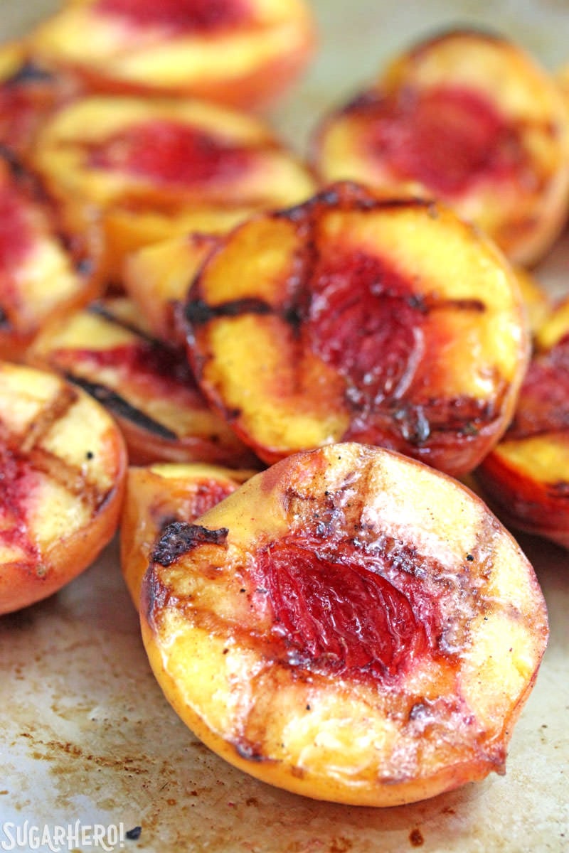 Grilled Pound Cake and Peaches - an easy summer dessert with honey-cinnamon caramel sauce! | From SugarHero.com Juicy, ripe grilled peaches | From SugarHero.com