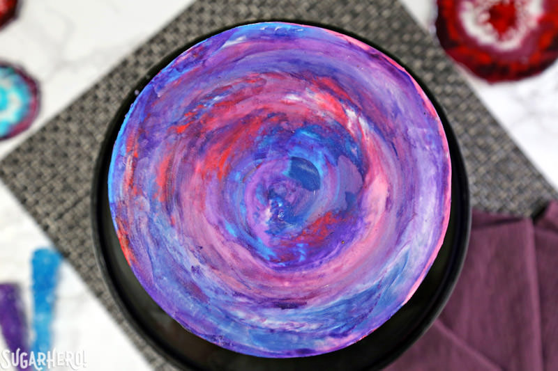 Agate Cake - close-up of the swirled watercolor buttercream effect on top of the agate cake | From SugarHero.com