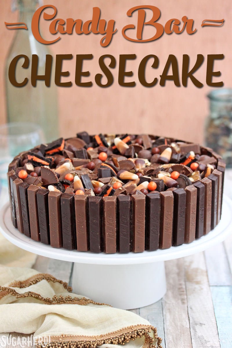 Candy Bar Cheesecake – a creamy chocolate-vanilla cheesecake PACKED with candy bars! It’s a great way to use up extra candy! | From SugarHero.com Candy Bar Cheesecake – a chocolate-vanilla cheesecake topped with leftover candy | From SugarHero.com