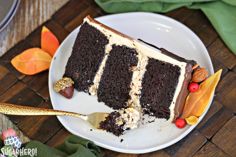 Festive Fall Layer Cake – single slice of cake with bite on fork | From SugarHero.com