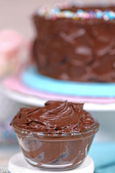 A small glass bowl of Chocolate Sour Cream Frosting.