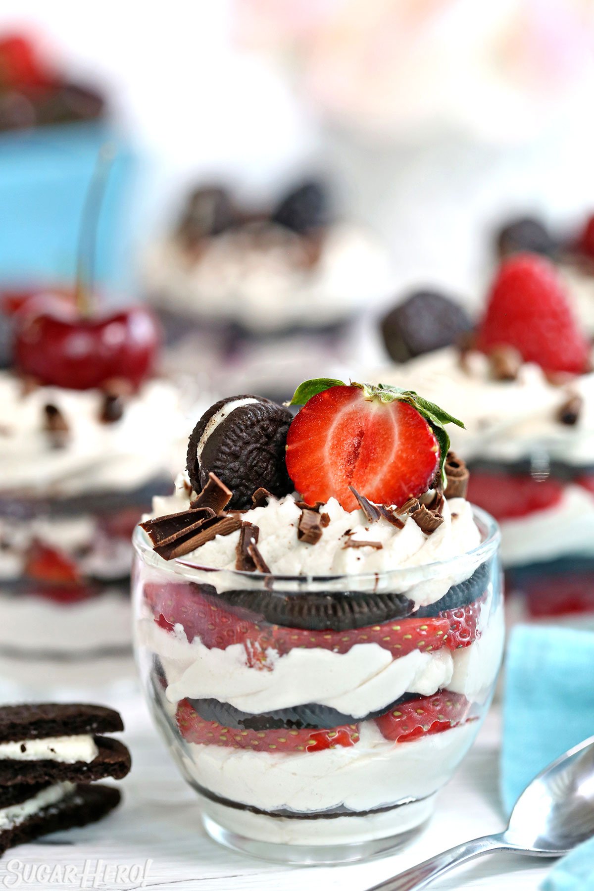 Mini Oreo Icebox Cakes are a simple, no-bake dessert. Oreo cookies, whipped cream, and fresh berries are all you need to make this quick and easy dessert! | From SugarHero.com Mini Oreo Icebox Cakes - no-bake Oreo cakes with fresh berries | From SugarHero.com