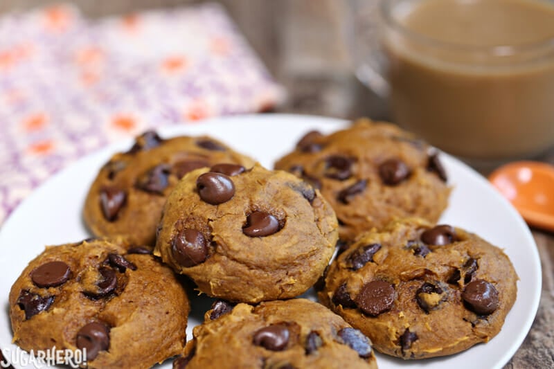 3-Ingredient Pumpkin Chocolate Chip Cookies are a super fast fall dessert! These cookies are made with 3 common pantry ingredients and the whole family is guaranteed to love them! | From SugarHero.com 3-Ingredient Pumpkin Chocolate Chip Cookies - plate of pumpkin chocolate chip cookies | From SugarHero.com
