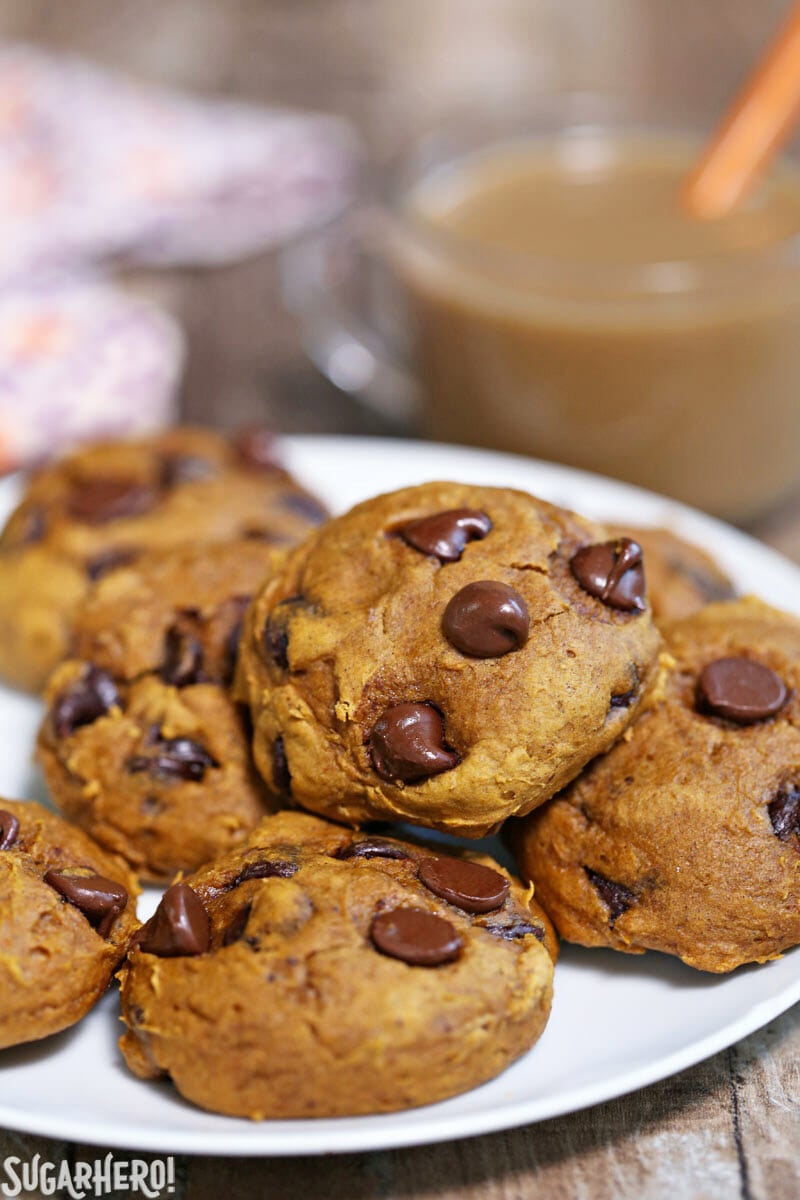 3-Ingredient Pumpkin Chocolate Chip Cookies are a super fast fall dessert! These cookies are made with 3 common pantry ingredients and the whole family is guaranteed to love them! | From SugarHero.com 3-Ingredient Pumpkin Chocolate Chip Cookies - plate of pumpkin chocolate chip cookies | From SugarHero.com