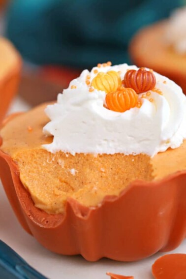 Pumpkin Pie Mousse Cup in orange candy bowl.