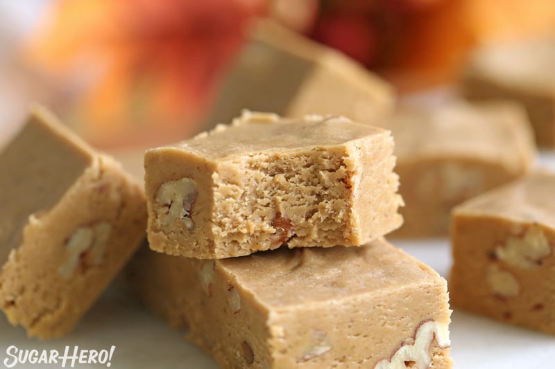 A close up of pumpkin fudge with a bite taken out