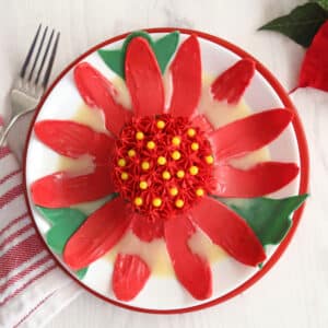 Hot white chocolate ganache being poured over a Blooming Chocolate Flower.