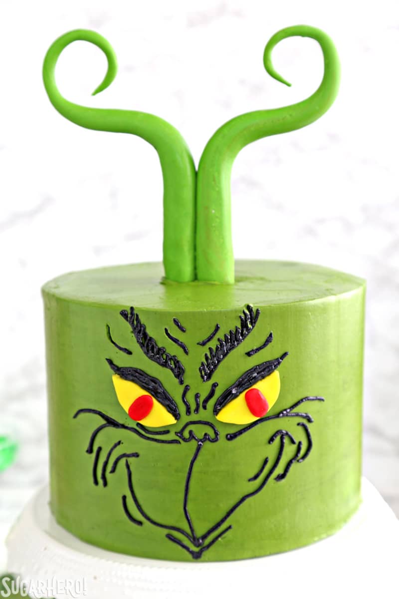 https://www.sugarhero.com/wp-content/uploads/2018/12/grinch-cake-3.jpg