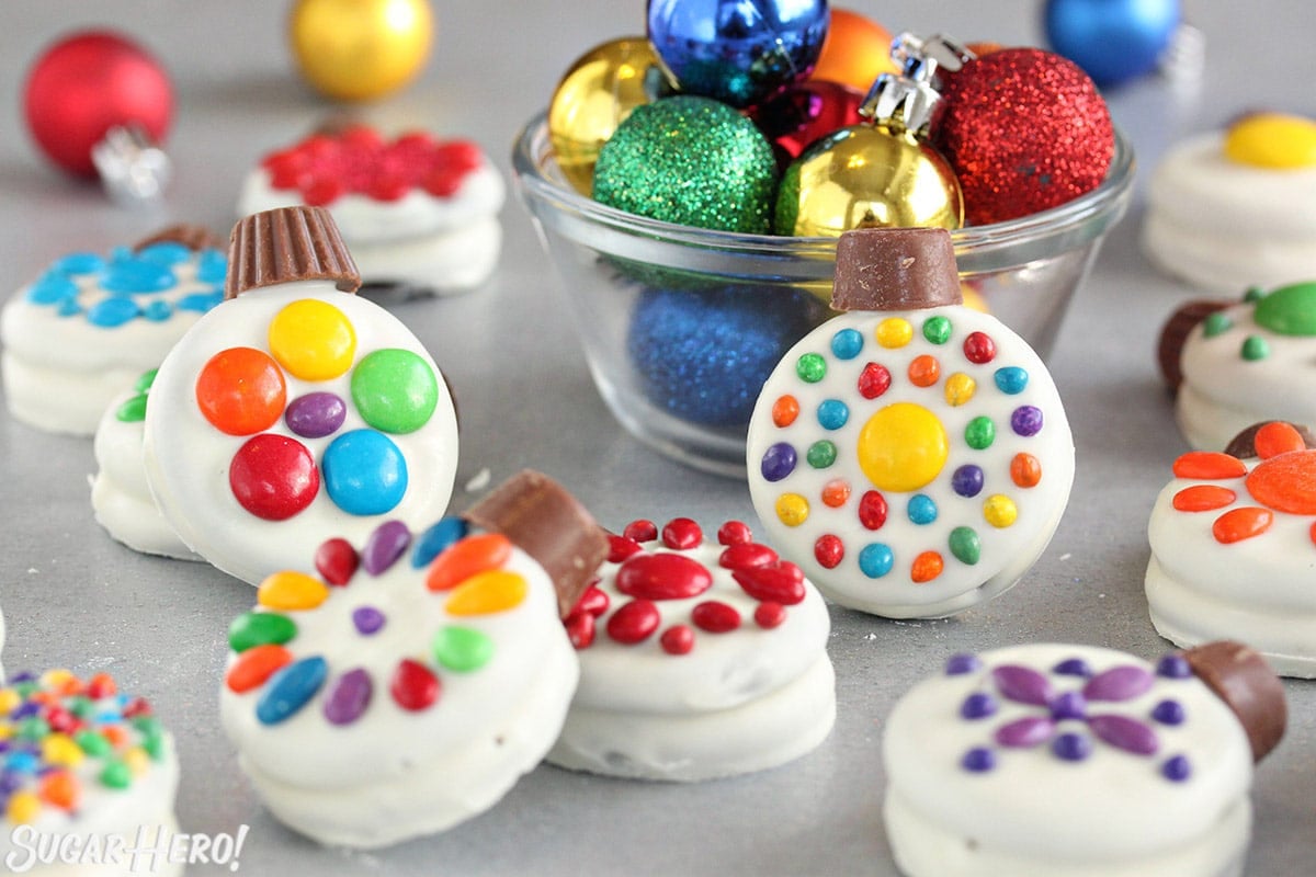 Close-up of Oreo Cookie Christmas Ornaments on a silver background.