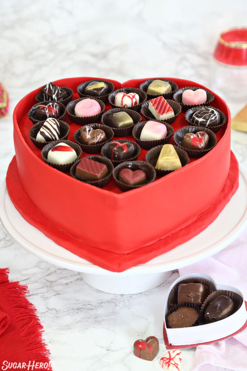 Box of Chocolates Cake - vertical picture of cake on white cake stand | From SugarHero.com