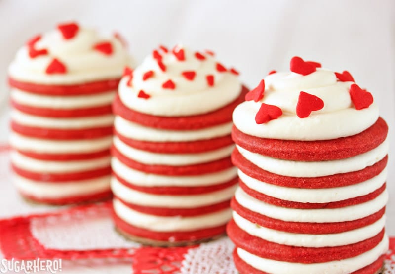 Red Velvet Icebox Cakes - Three separate Icebox Cakes with heart sprinkles | From SugarHero.com 
