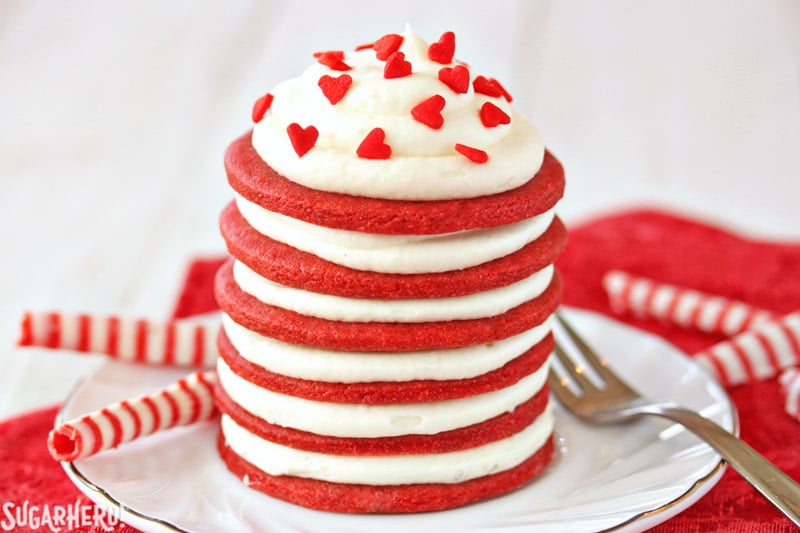 Red Velvet Icebox Cakes - A single Red Velvet Icebox Cake with heart sprinkles | From SugarHero.com