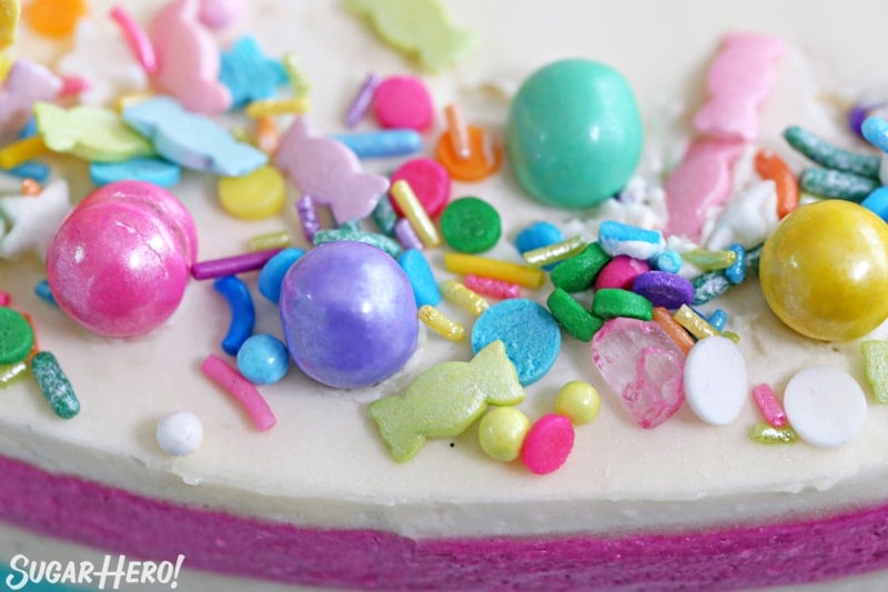 Close-up of the colorful sprinkle assortment on top of a Striped Buttercream Balloon Cake.