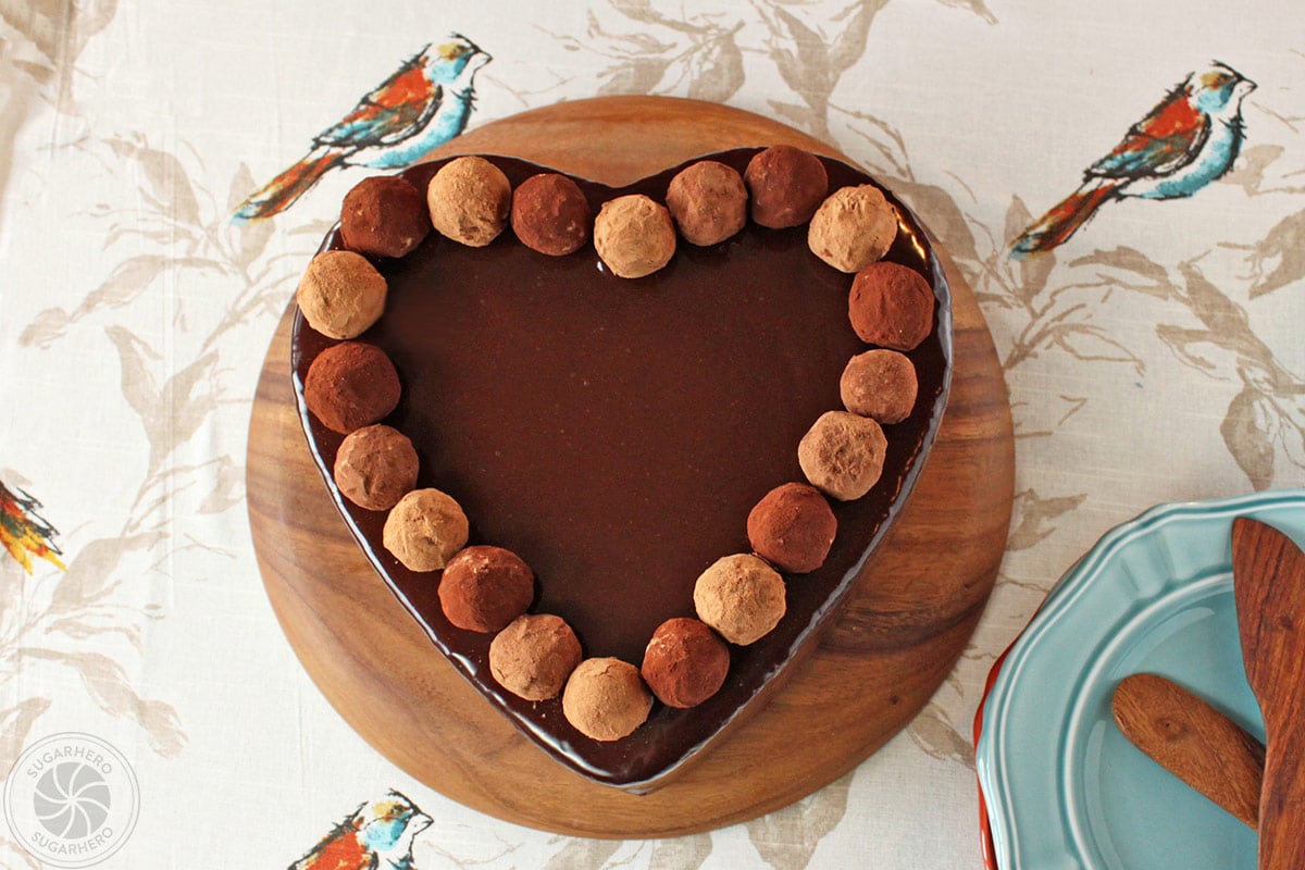 Truffle-Topped Heart Cake - Heart cake from the top view with the truffles lining the top. | From SugarHero.com 