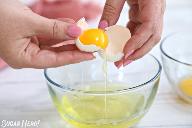Separating eggs using an egg shell to divide the yolk from the whites