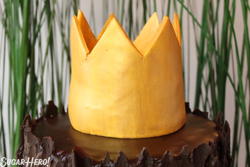 Where the Wild Things Are Birthday Cake - Close up shot of the gold fondant crown. | From SugarHero.com 
