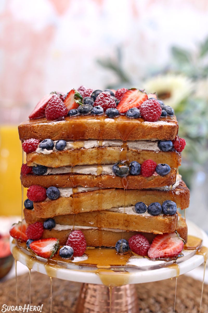 French toast cake with syrup streaming down the sides