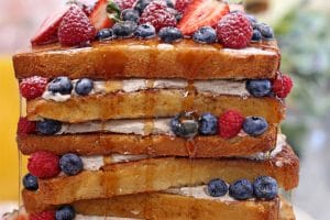 Photo of a French Toast Cake with text overlay for Pinterest.