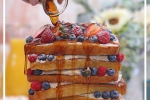 Photo of a French Toast Cake with text overlay for Pinterest.