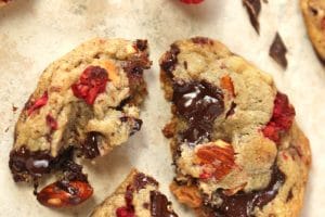 Photo of Raspberry Almond Chocolate Chunk Cookies with text overlay for Pinterest.