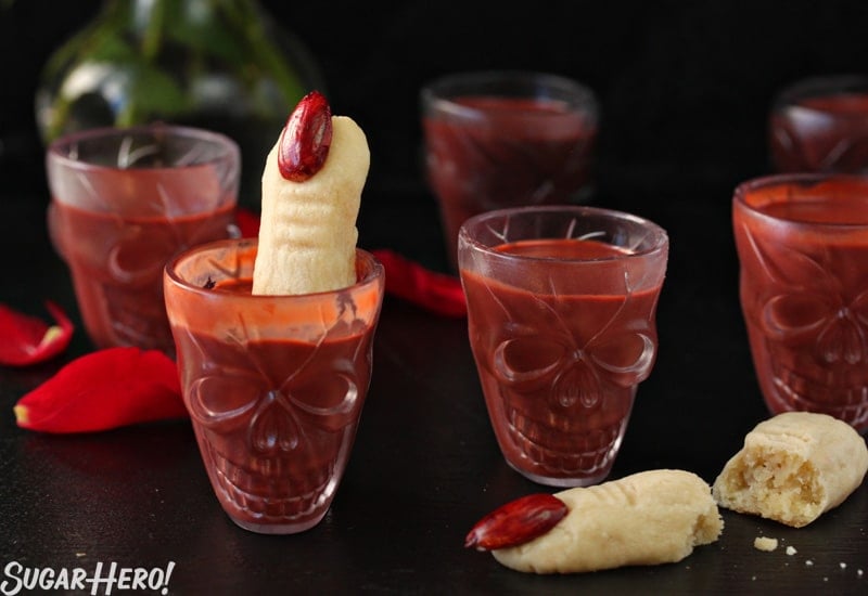 This Red Velvet Hot Chocolate - A straight shot of multiple skull glasses filled with hot chocolate. | From SugarHero.com