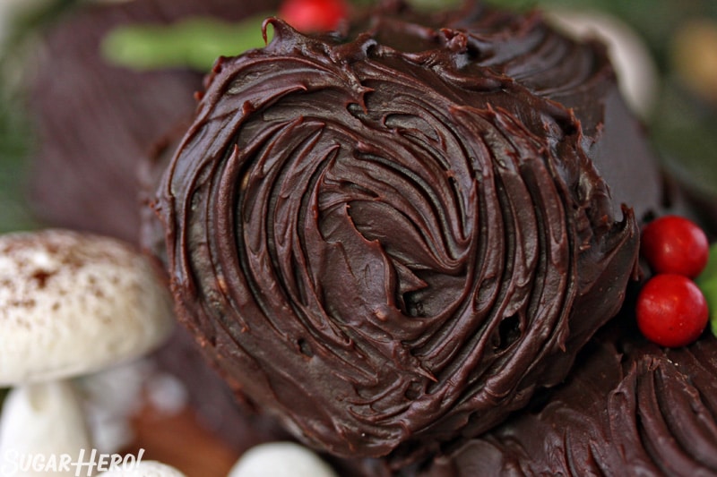 Peanut Butter Cup Yule Log - A close up of the the yule log, with streaks in it to resemble a log. | From SugarHero.com
