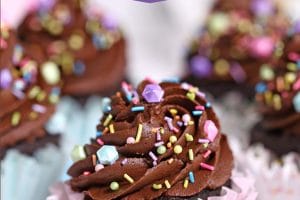 Photo of Chocolate Cupcakes with text overlay for Pinterest.
