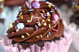 Photo of Chocolate Cupcakes with text overlay for Pinterest.