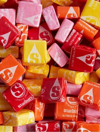 close-up of assorted Starburst candies in wrappers