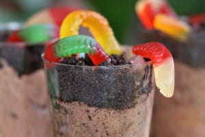 Photo of Worms and Dirt Pudding Cups with text overlay for Pinterest.