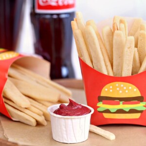Sugar Cookie French Fries in french fry container, with red frosting as ketchup.