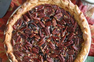 Overhead shot of Deep Dish Pecan Pie with overlay text for Pinterest
