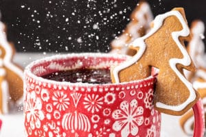 Tree-shaped Gingerbread Cookie Mug Topper on a red mug with overlay text for Pinterest