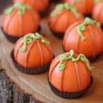 Close-up of Pumpkin Bread Truffles on wooden plate